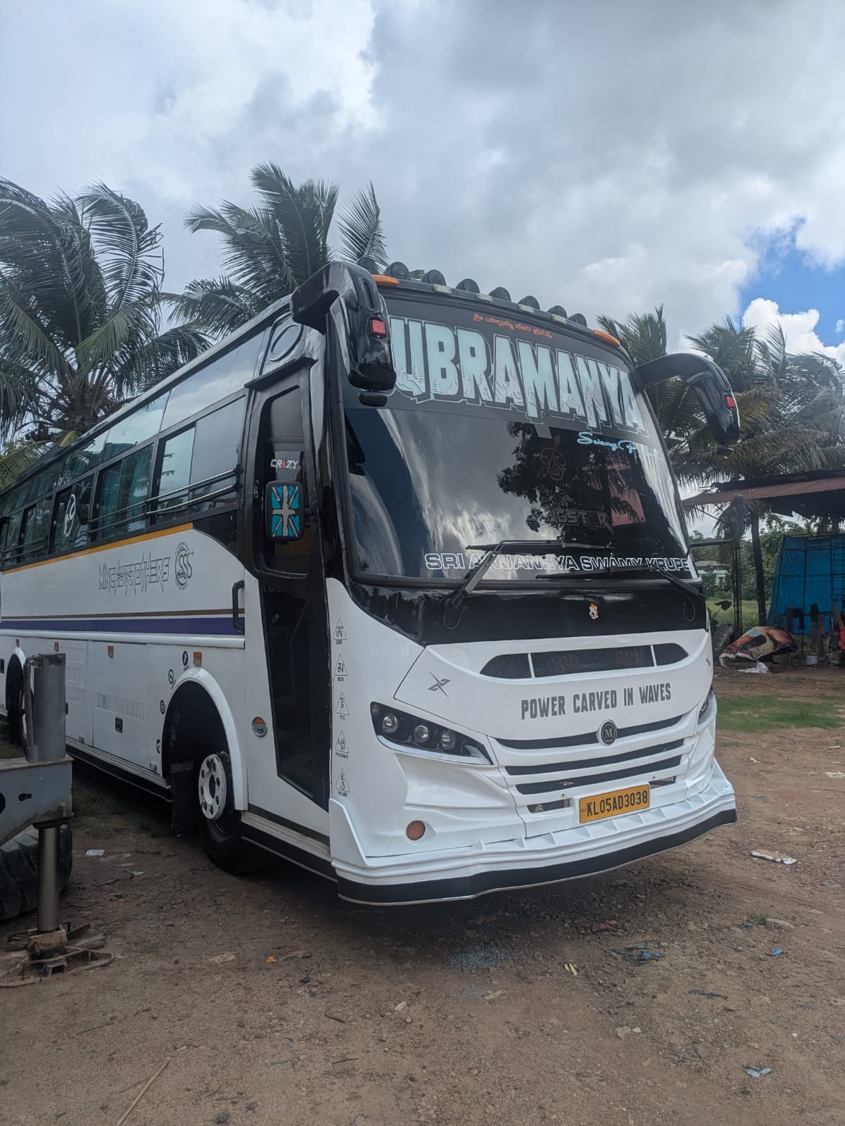 Tempo Traveller on a Bangalore road heading out on tour
